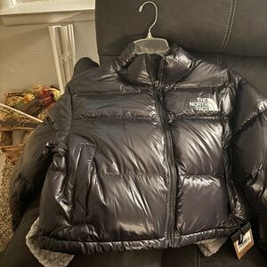 Large brand new North Face cropped puffer jacket.